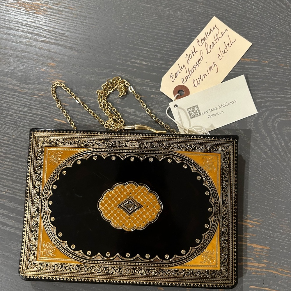 Black and Gold Embossed Leather Clutch with Chain Strap: Sold in Picasso Exhibit